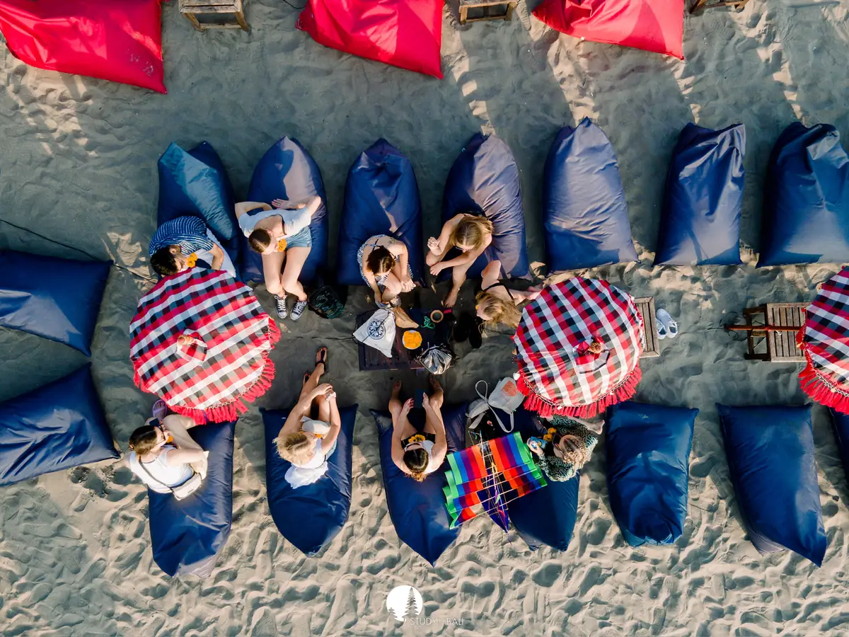 Students at a beach lounge