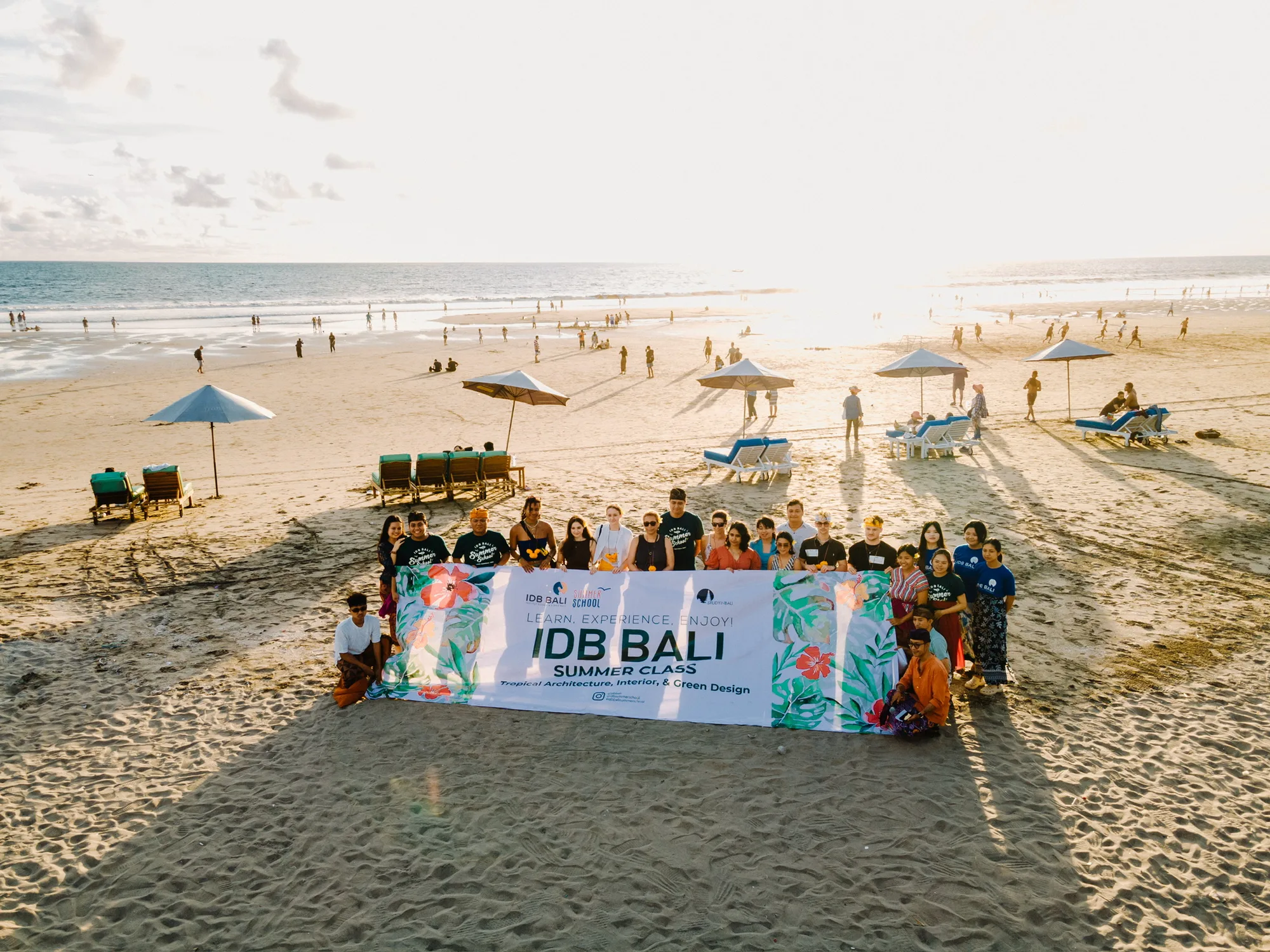The cohort together on the beach