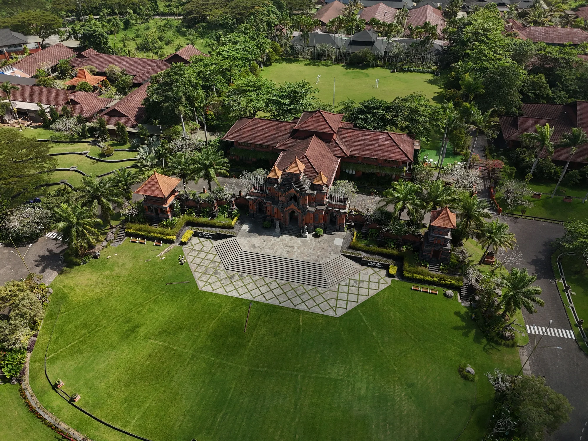 The PIB College campus in Tabanan seen from the air, with the Gapura Bhagawan gate at its centre