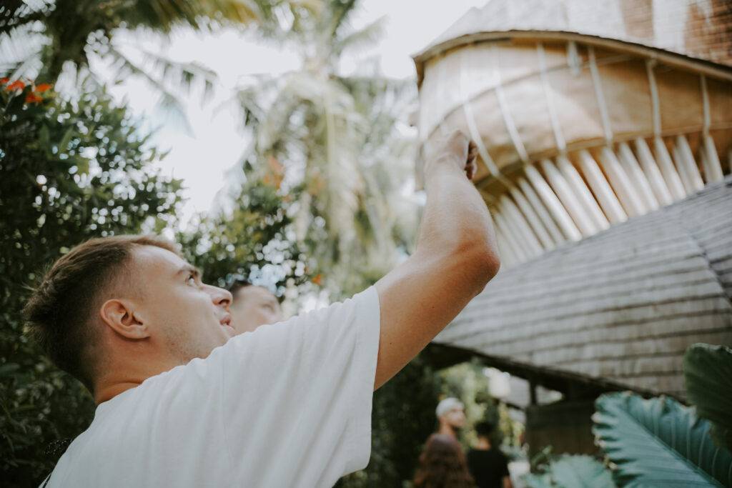 Students from the Southeast Asian Architecture and Southeast Asian Engineering study abroad programs at Universitas Udayana (UNUD) on a field trip to Ulaman Resort, exploring the unique structures of tropical buildings in Bali.